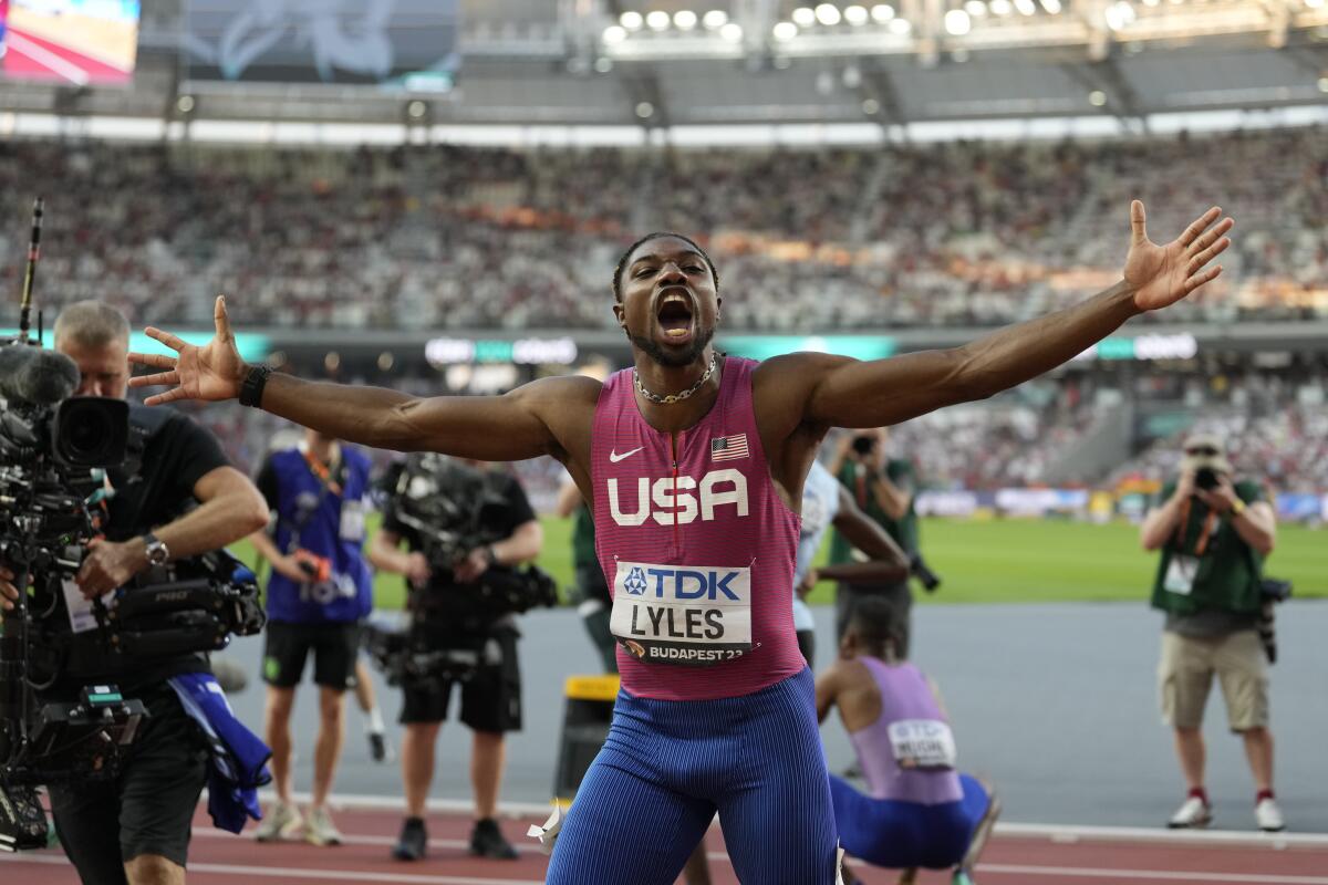 Noah Lyles breaks into tears on medal stand after receiving gold