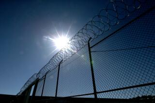 Represa CA - April 13: Razor wire tops a fence near the Short-Term Restricted Housing Unit at California State Prison, Sacramento. The unit is for prisoners in segregated or solitary confinement. The California legisature is considering another bill (AB 280) to restrict solitary confinement after a similar proposal died last year. (Luis Sinco / Los Angeles Times)