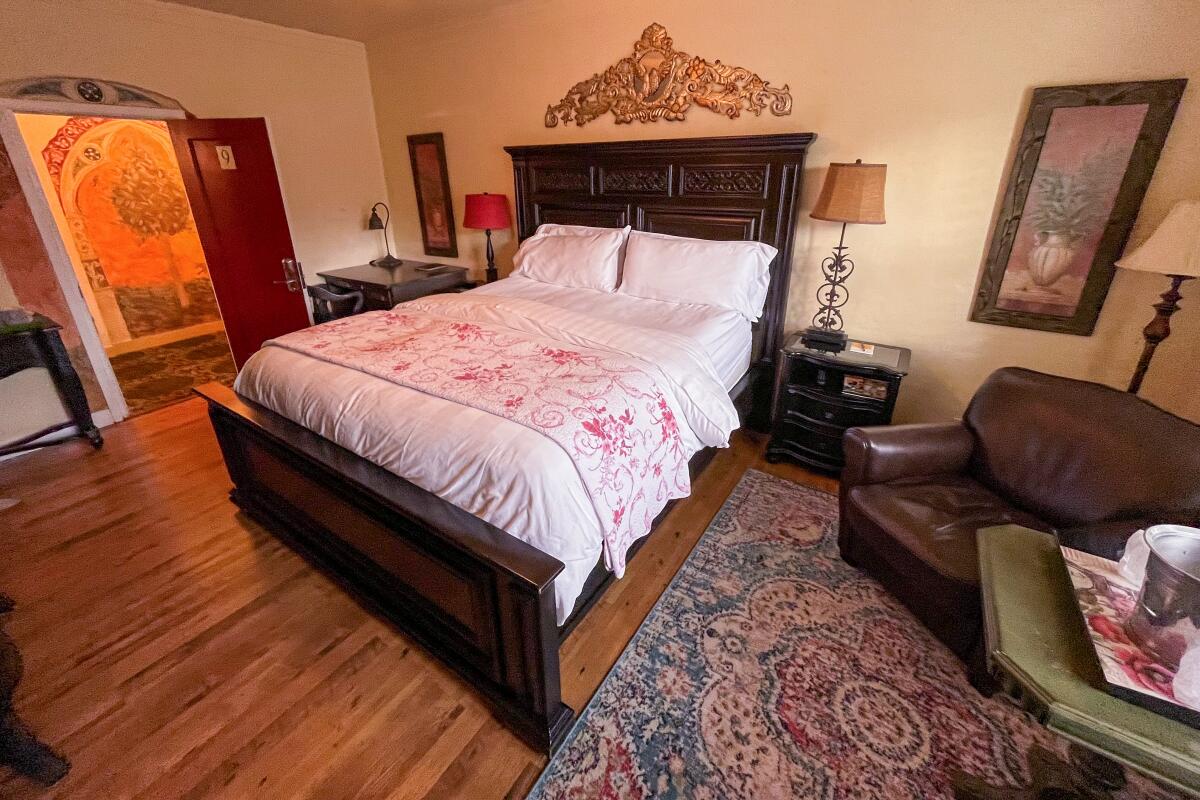 A bedroom at a hotel.
