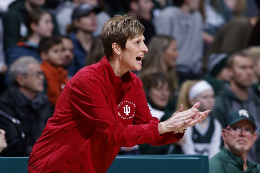 FILE - Indiana coach Teri Moren applauds during the first half of the team's NCAA college basketball game against Michigan State on Thursday, Dec. 29, 2022, in East Lansing, Mich. Moren was honored Thursday, March 30, 2023, as The Associated Press women's college basketball Coach of the Year. (AP Photo/Al Goldis, File)
