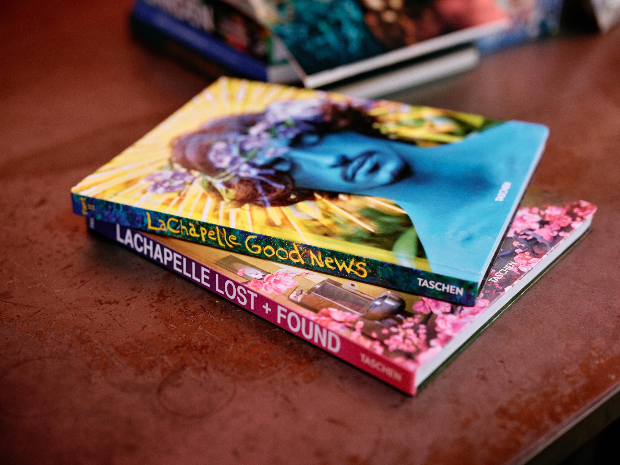 The books "Lost & Found" and "Good News" by David LaChapelle.