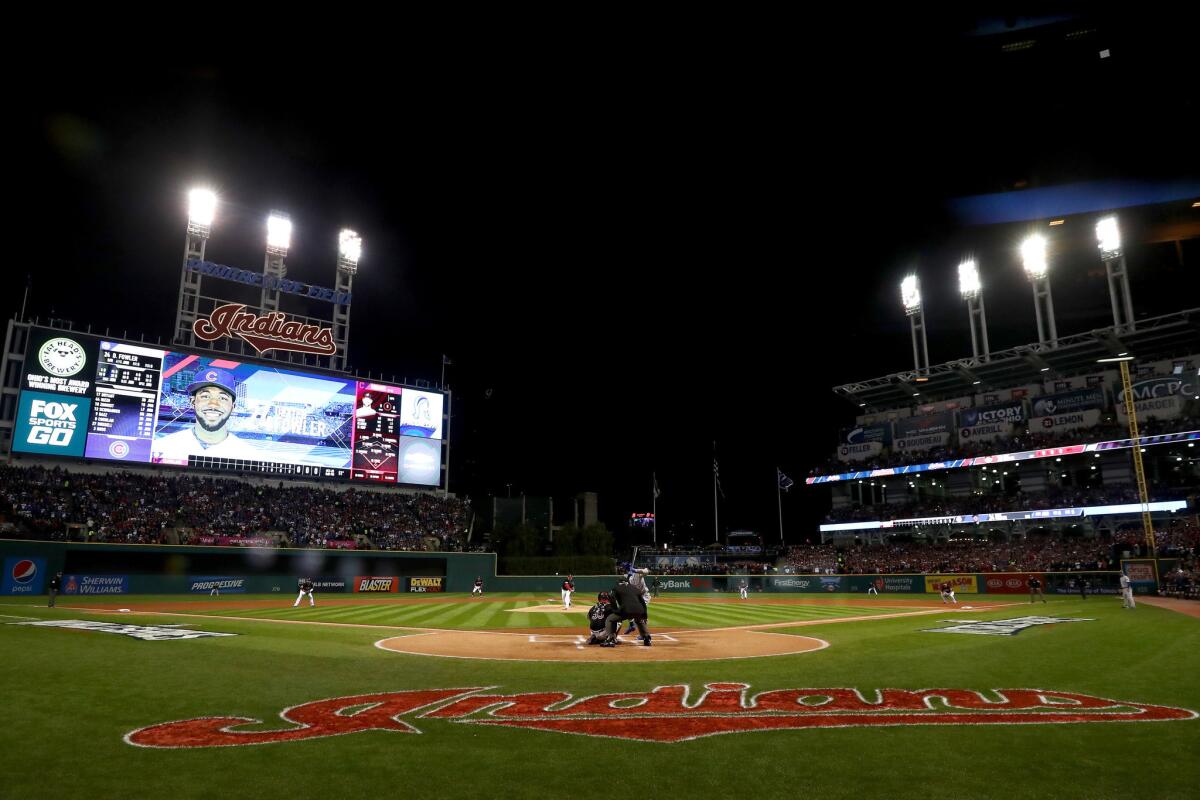 Indians pitcher Corey Kluber (28) throws the first pitch against the Cubs during the first inning of Game 1 of the 2016 World Series.