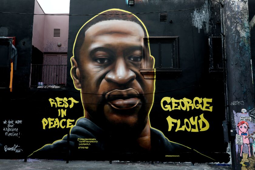 LOS ANGELES, CA - JUNE 05: Artists have memorialized George Floyd, who died while in-custody of the Minneapolis Police, with murals and street art in the Melrose District on Friday, June 5, 2020 in Los Angeles, CA. (Gary Coronado / Los Angeles Times)