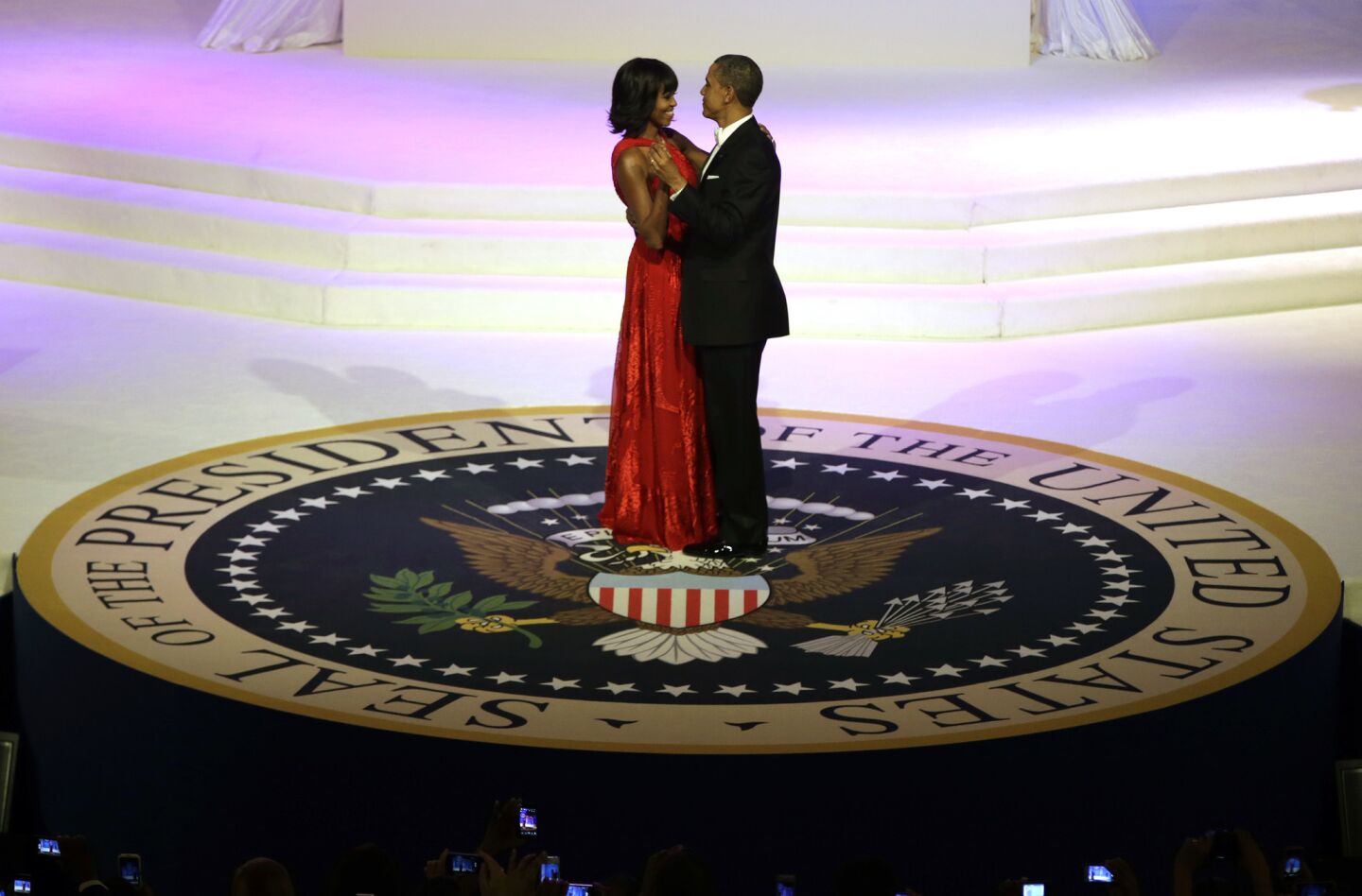 President Obama and First Lady Michelle Obama share a dance during the Commander-In-Chief Inaugural ball at the Washington Convention Center.
