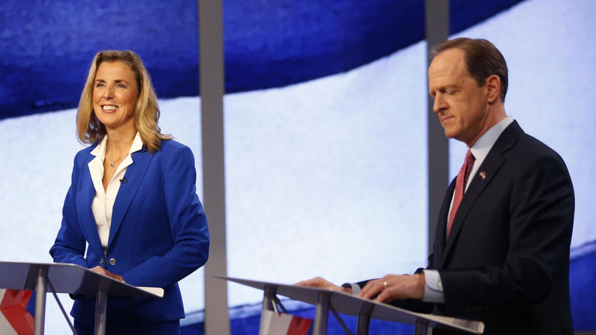 Pennsylvania U.S. Senate candidates Katie McGinty, a Democrat, and Patrick J. Toomey, the Republican incumbent, prepare for a recent debate in Pittsburgh.