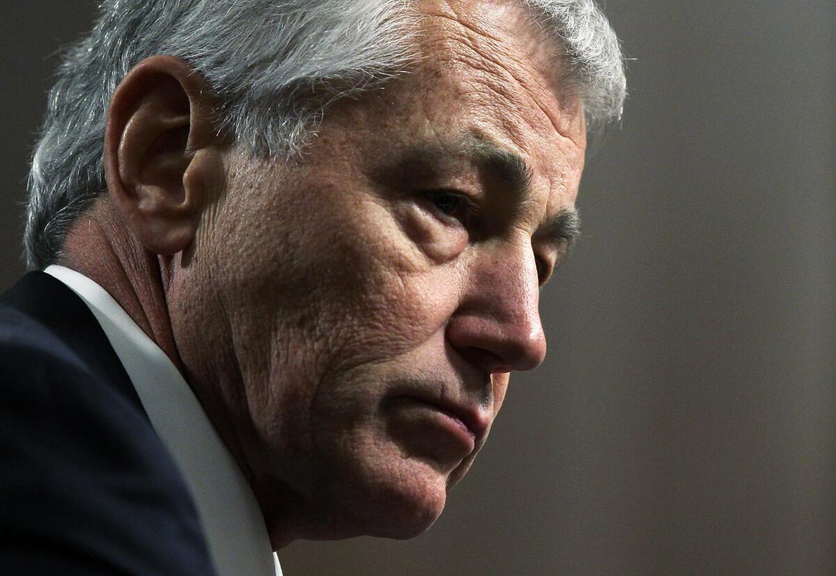 Former Sen. Chuck Hagel (R-Neb.) testifies before the Senate Armed Services Committee during his confirmation hearing to become the next secretary of defense on Capitol Hill.