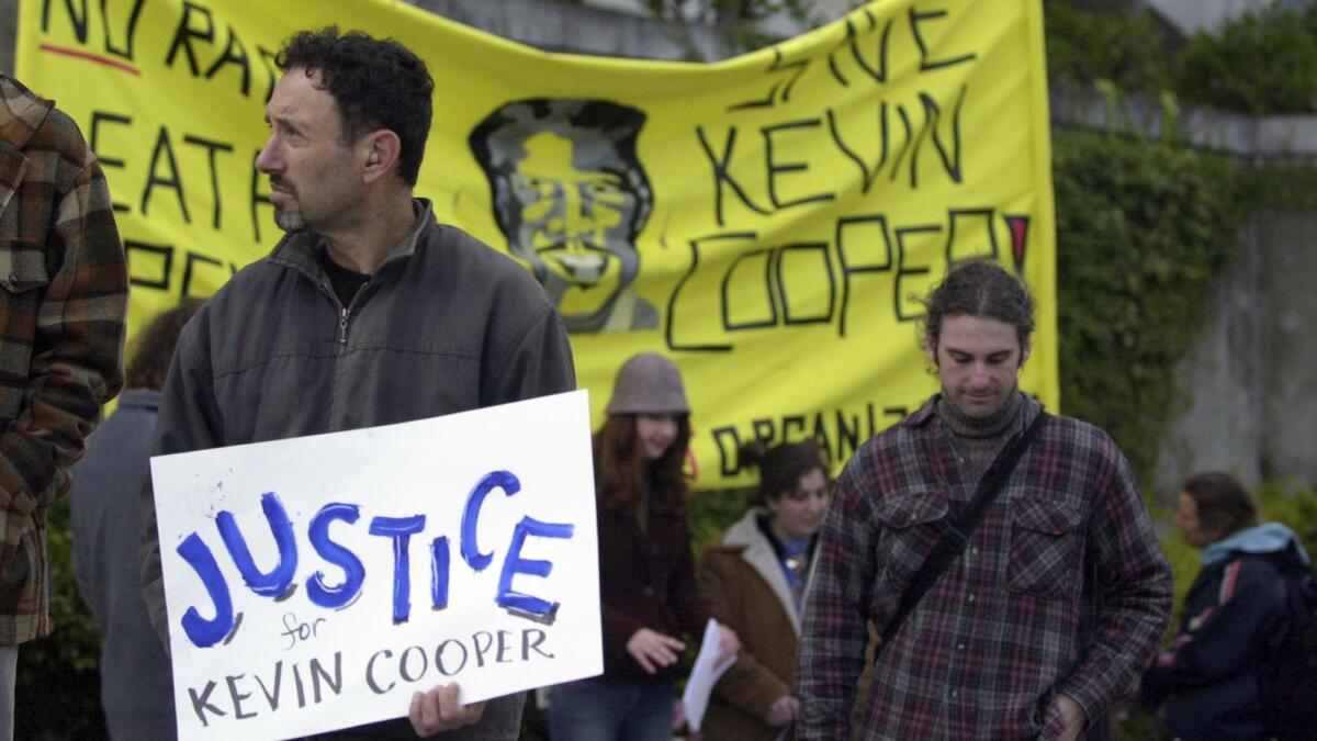 Anti-death-penalty advocates demonstrate in support of convicted killer Kevin Cooper in San Francisco in 2004.