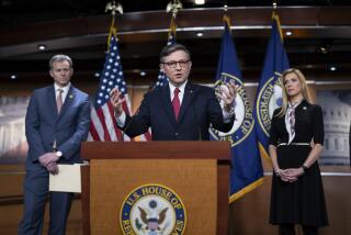Speaker of the House Mike Johnson, R-La., center, flanked by Rep. Blake Moore, R-Utah, left, and Rep. Beth Van Duyne, R-Texas, discusses President Joe Biden for his policies at the Mexican border during a news conference at the Capitol in Washington, Thursday, Feb. 29, 2024. (AP Photo/J. Scott Applewhite)