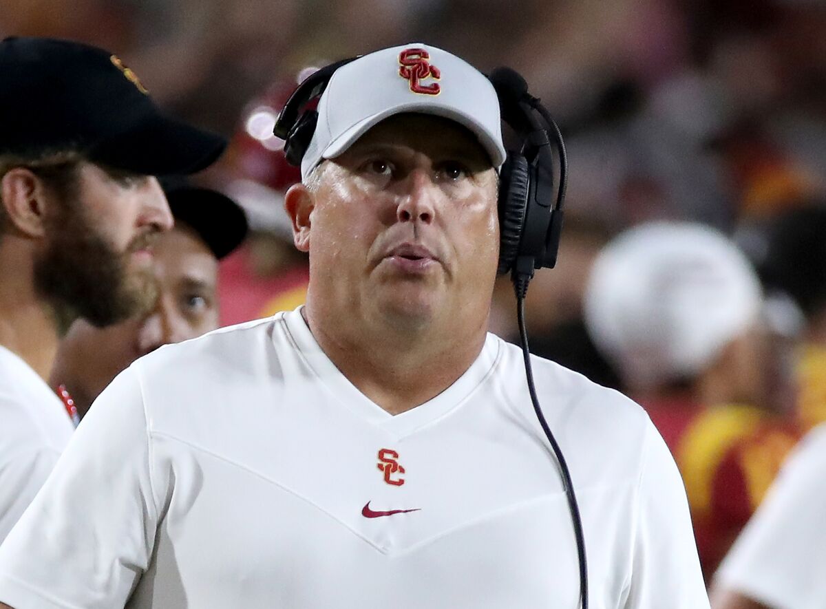 USC coach Clay Helton looks on from the sideline during Saturday's loss to Stanford.