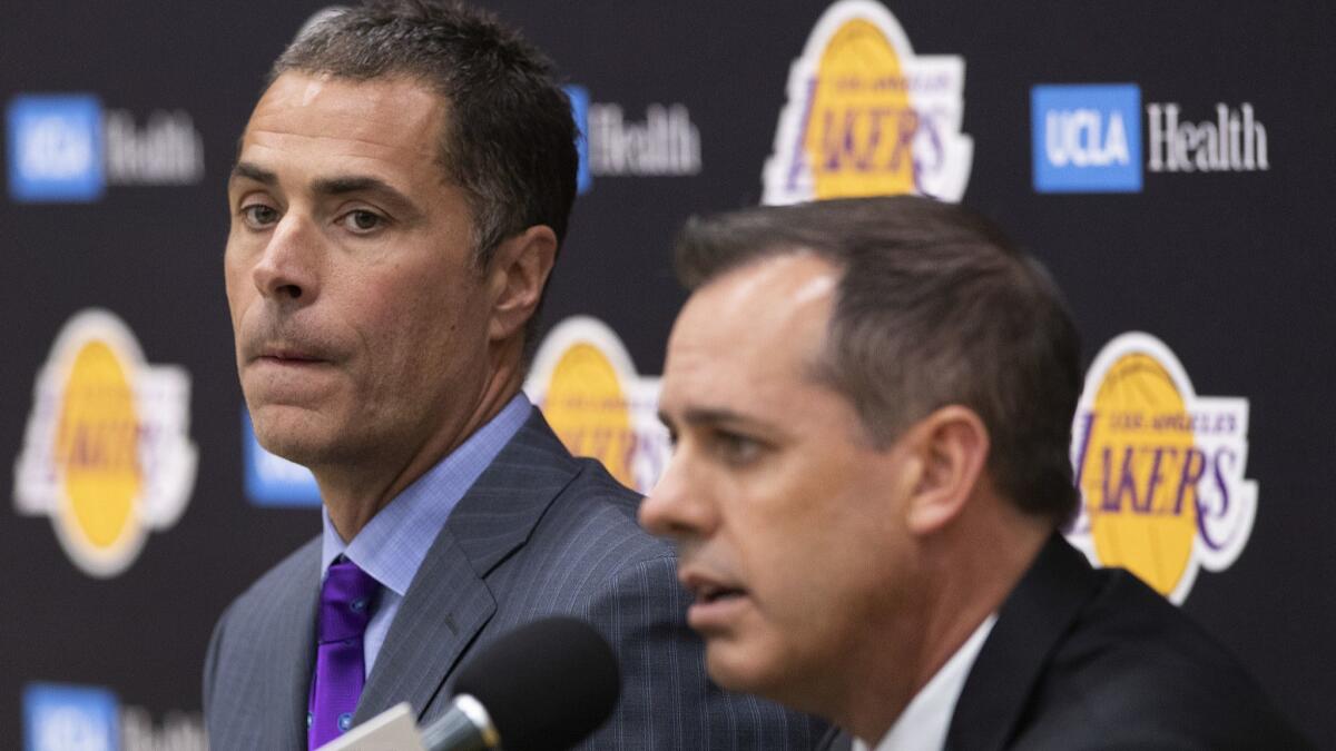 Frank Vogel is the Lakers’ new coach, but general manager Rob Pelinka, left, is under the NBA spotlight now.
