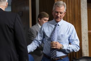 Sen. Tommy Tuberville, R-Ala., arrives for a Senate Armed Services Committee hearing on Navy Adm. Lisa Franchetti's nomination for reappointment to the grade of admiral and to be Chief of Naval Operations, Thursday, Sept. 14, 2023, on Capitol Hill in Washington. (AP Photo/Jacquelyn Martin)