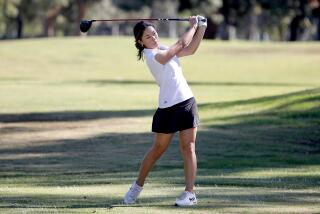 Palisades junior Anna Song hits from the 18th tee during the City Section Championships at Balboa Golf Course in Encino.