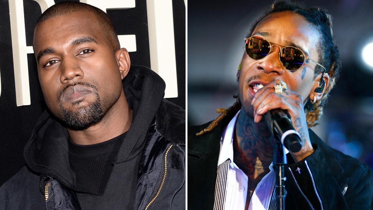 Rappers Kanye West and Wiz Khalifa have reportedly ended their feud.