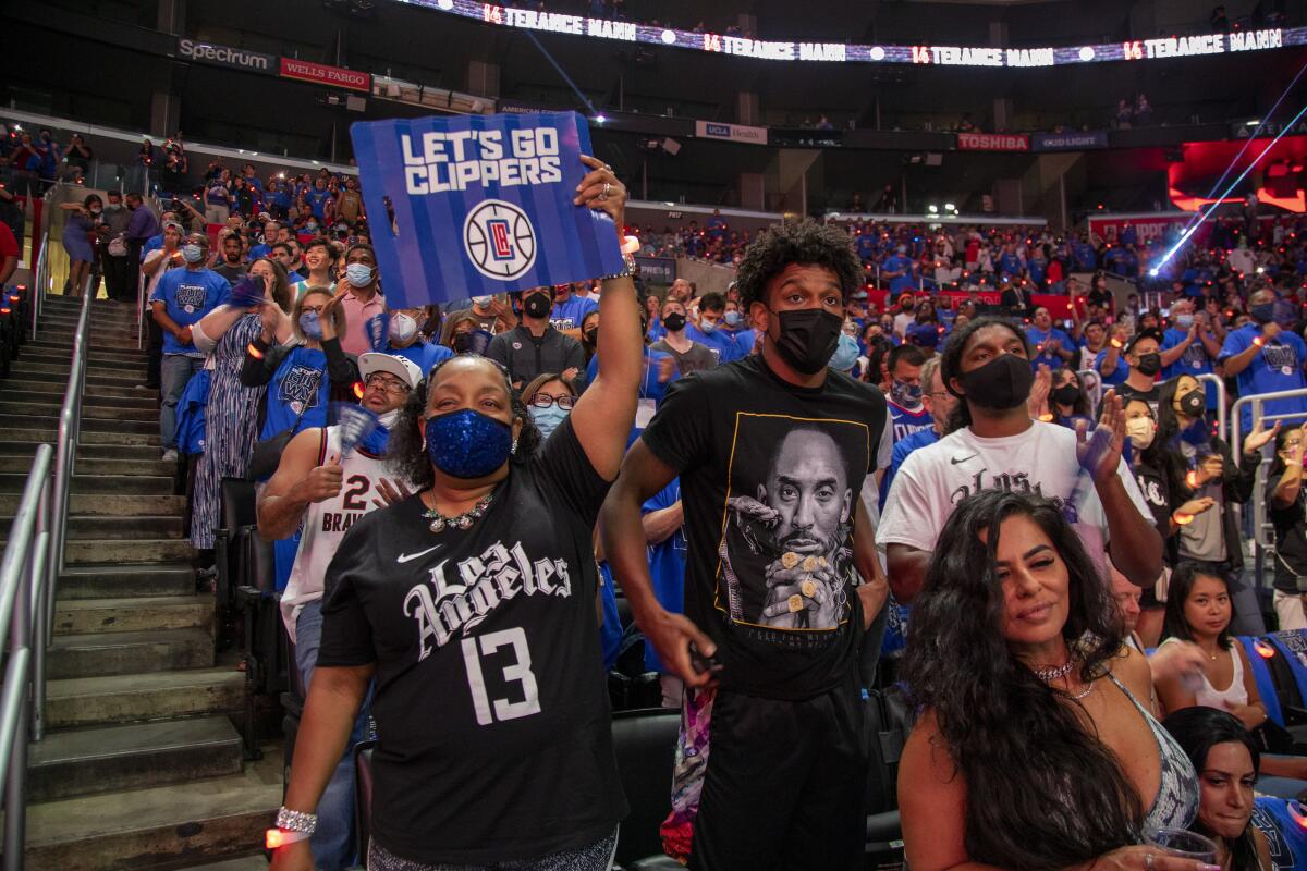 Clippers fans cheer on the team during Game 6 of the NBA Western Conference semifinals.