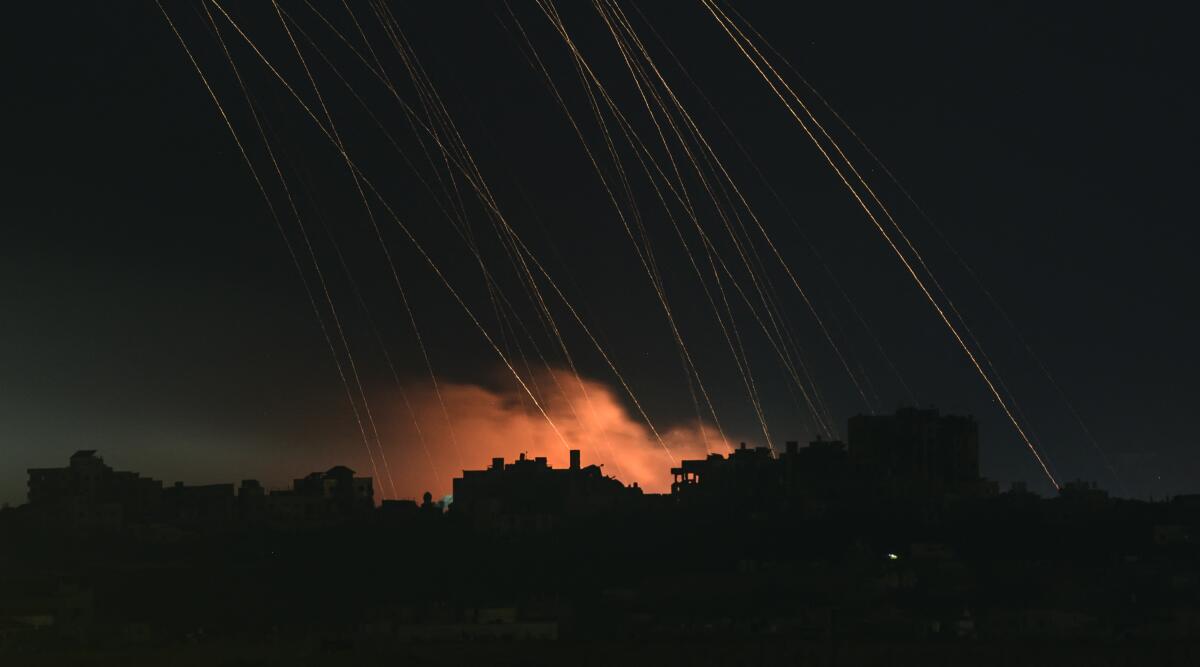 A long exposure showing shells falling 