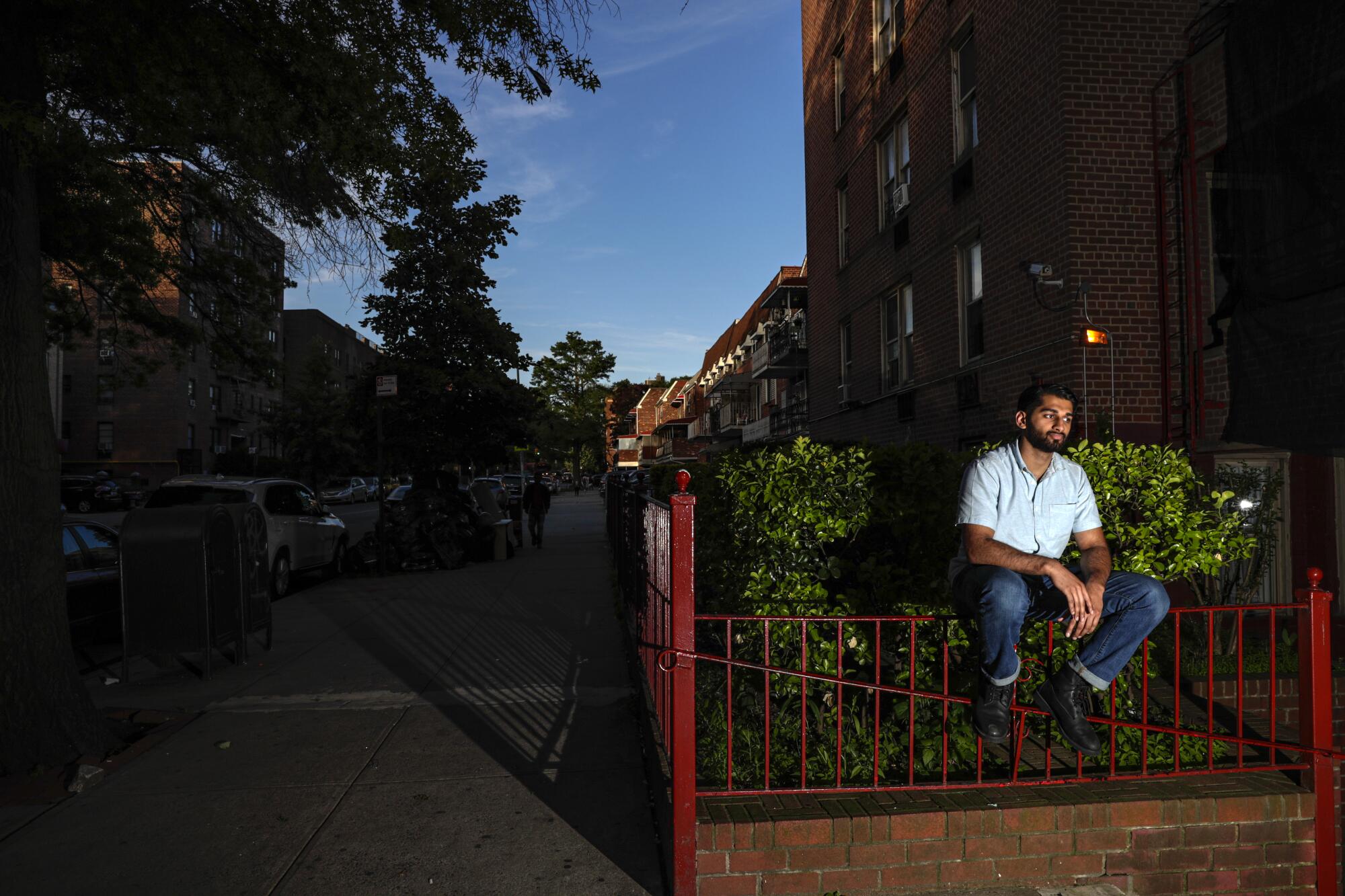 Rabbani outside the New York apartment where he grew up.
