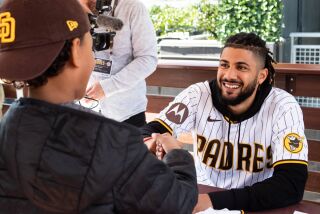 San Diego, CA - February 04: Fernando Tatis Jr. signs autographs during the Padres' 2023 FanFest at Petco Park on Saturday, Feb. 4, 2023 in San Diego, CA. (Meg McLaughlin / The San Diego Union-Tribune)