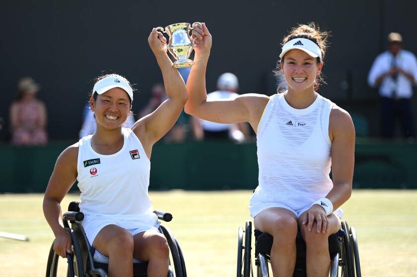 San Diego native Dana Mathewson, right, is shown with wheelchair tennis partner Yui Kamiji of Japan.