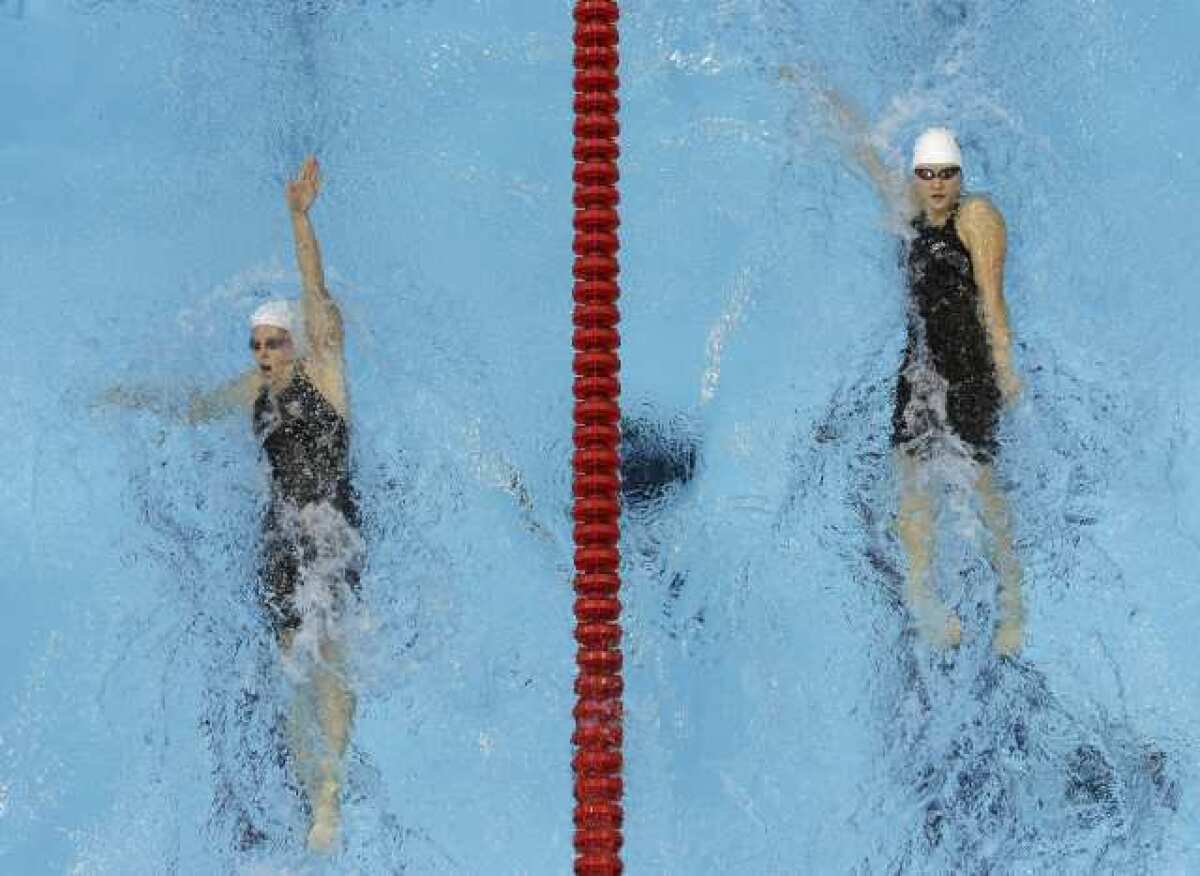 China's Ye Shiwen, right, and Australia's Alicia Coutts compete in the women's 200-meter individual medley.