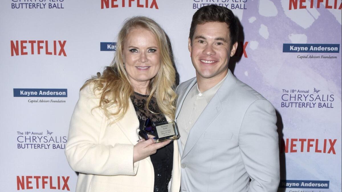 Honoree Suzanne Todd and Adam Devine at the 18th Chrysalis Butterfly Ball.