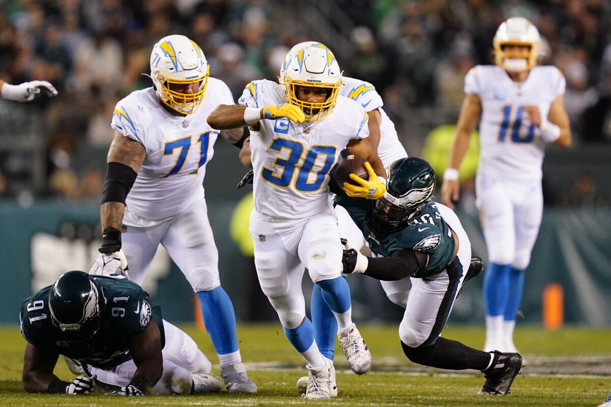 Chargers running back Austin Ekeler carries the ball during a win over the Philadelphia Eagles on Nov. 7.
