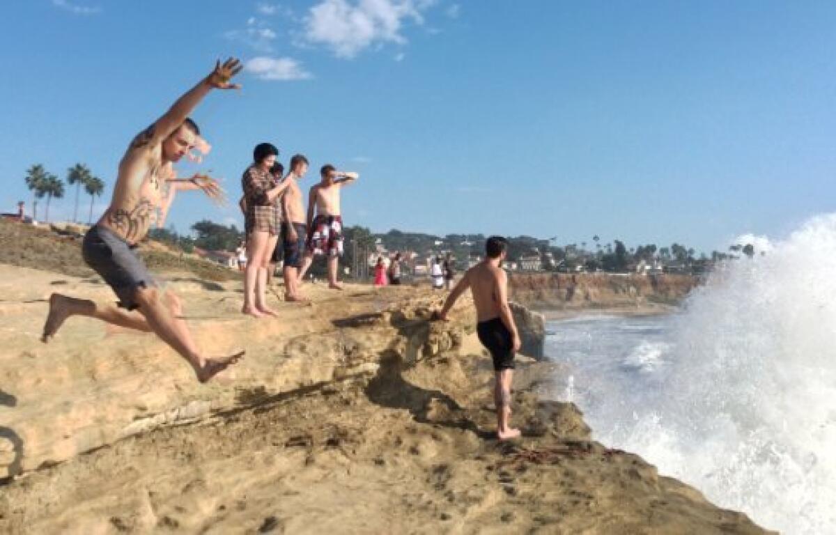 Explosive waves drenched beach-goers Monday at Sunset Cliffs. — Gary Robbins