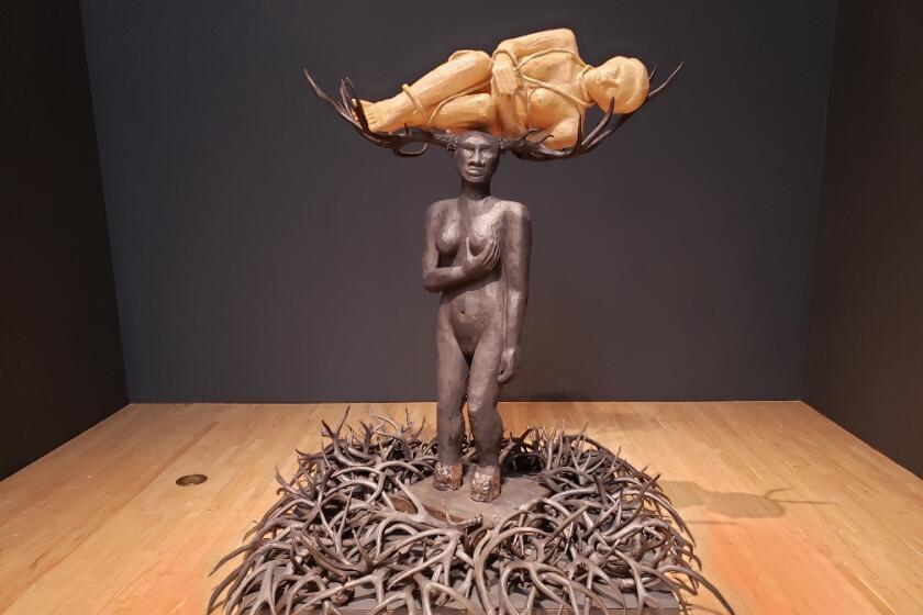 Alison Saar, "Rouse," 2012, wood, bronze, fiberglass, antler sheds