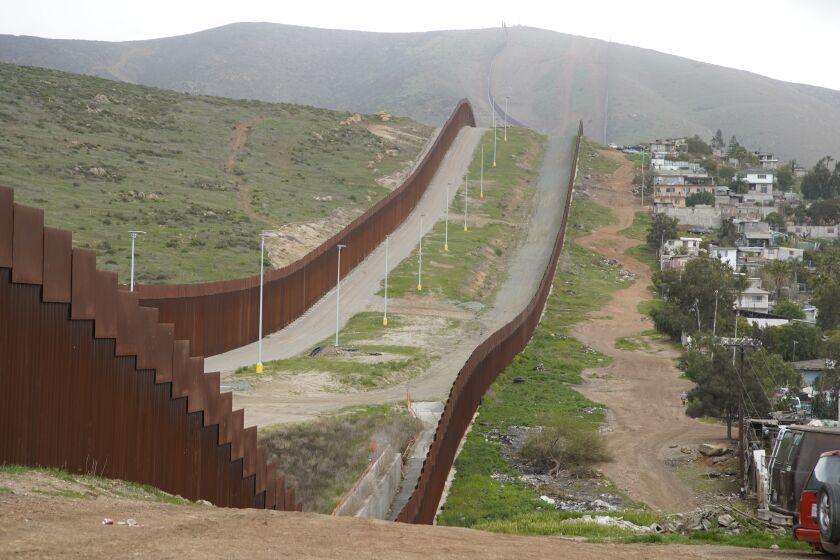 The border fence at Colonia Magisterial on Tuesday, March 23, 2021 in Tijuana, Baja California.