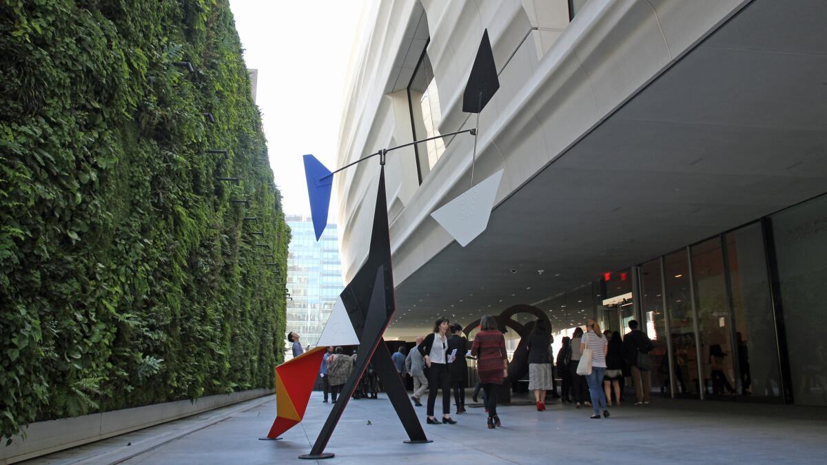 The building's rounded edges soften its presence — an effect that keeps the third-floor sculpture garden feeling hospitable. (You don't feel like you're standing at the bottom of a vertical shaft.) The garden also boasts a green wall with native Northern California plants, a refreshing touch in the middle of this urban setting.