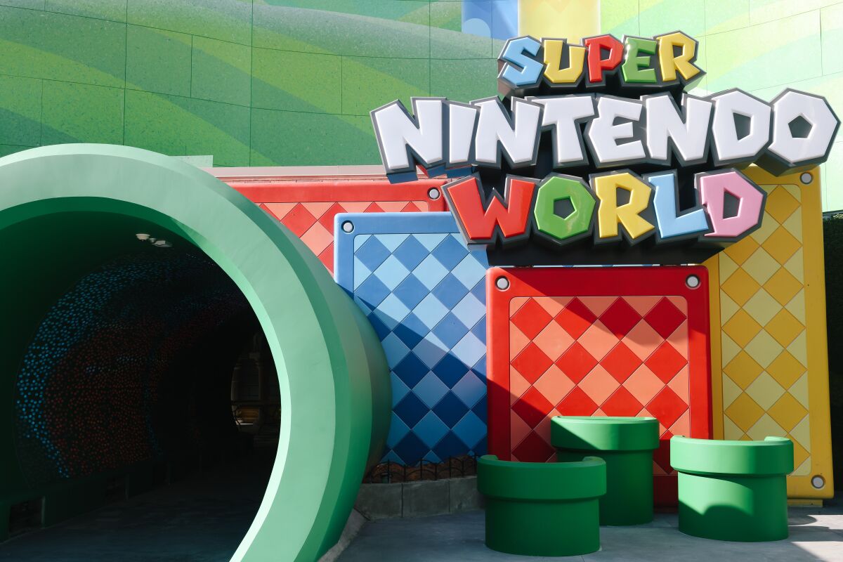 The green-pipe entrance to Super Nintendo World.