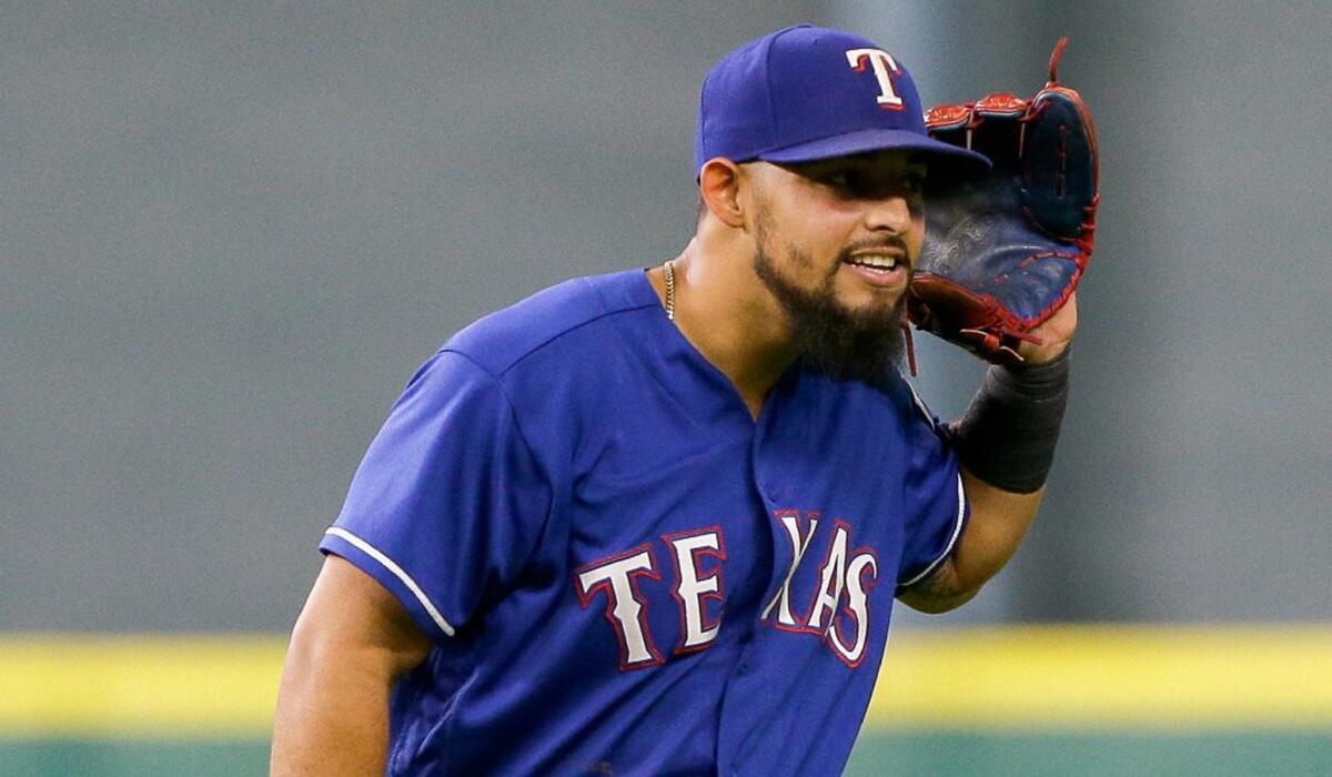 Rangers second baseman Rougned Odor (12) taunts Houston Astros fans in the fifth inning.