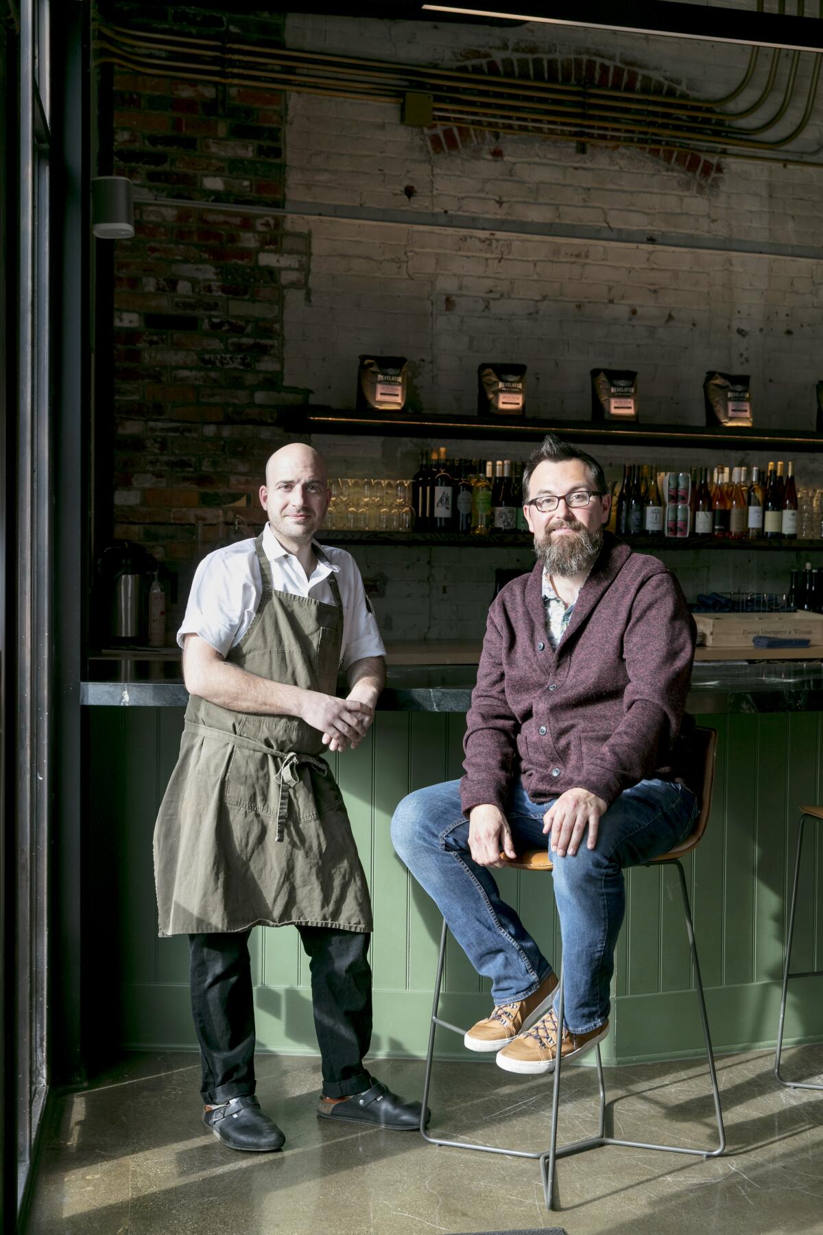 Bar Avalon chef Joshua Guarneri (left) and general manager and advanced sommelier Nathaniel Muñoz, pose for a portrait.