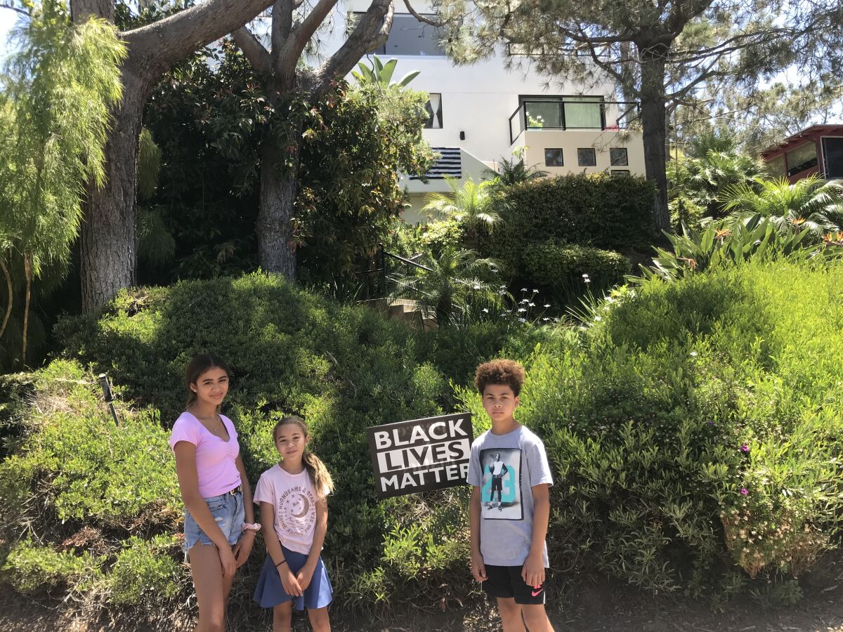 Del Mar resident Nicole Forrest and her three children have helped support the Black Lives Matter cause locally.