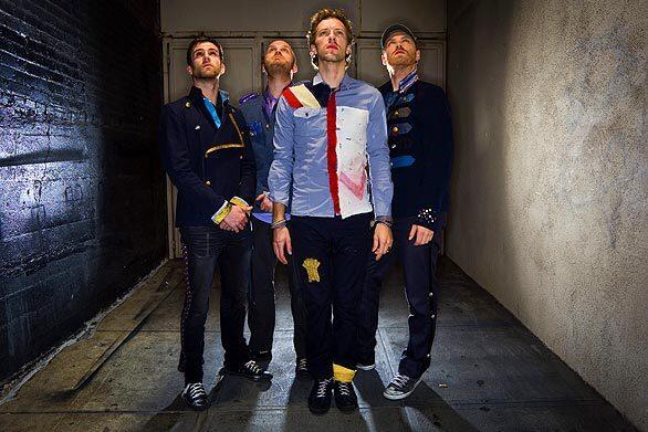 The band Coldplay is photographed in an alleyway outside the "Jimmy Kimmel Live" studio in Hollywood this month. From left, bassist Guy Berryman, drummer Will Champion, singer-keyboardist Chris Martin and guitarist Jonny Buckland.