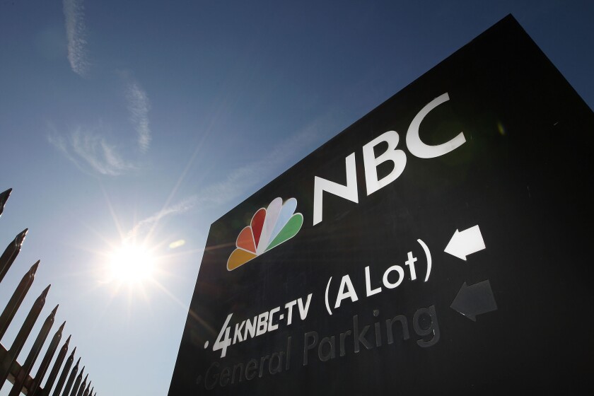 An NBC sign stands at the the studios in Burbank.