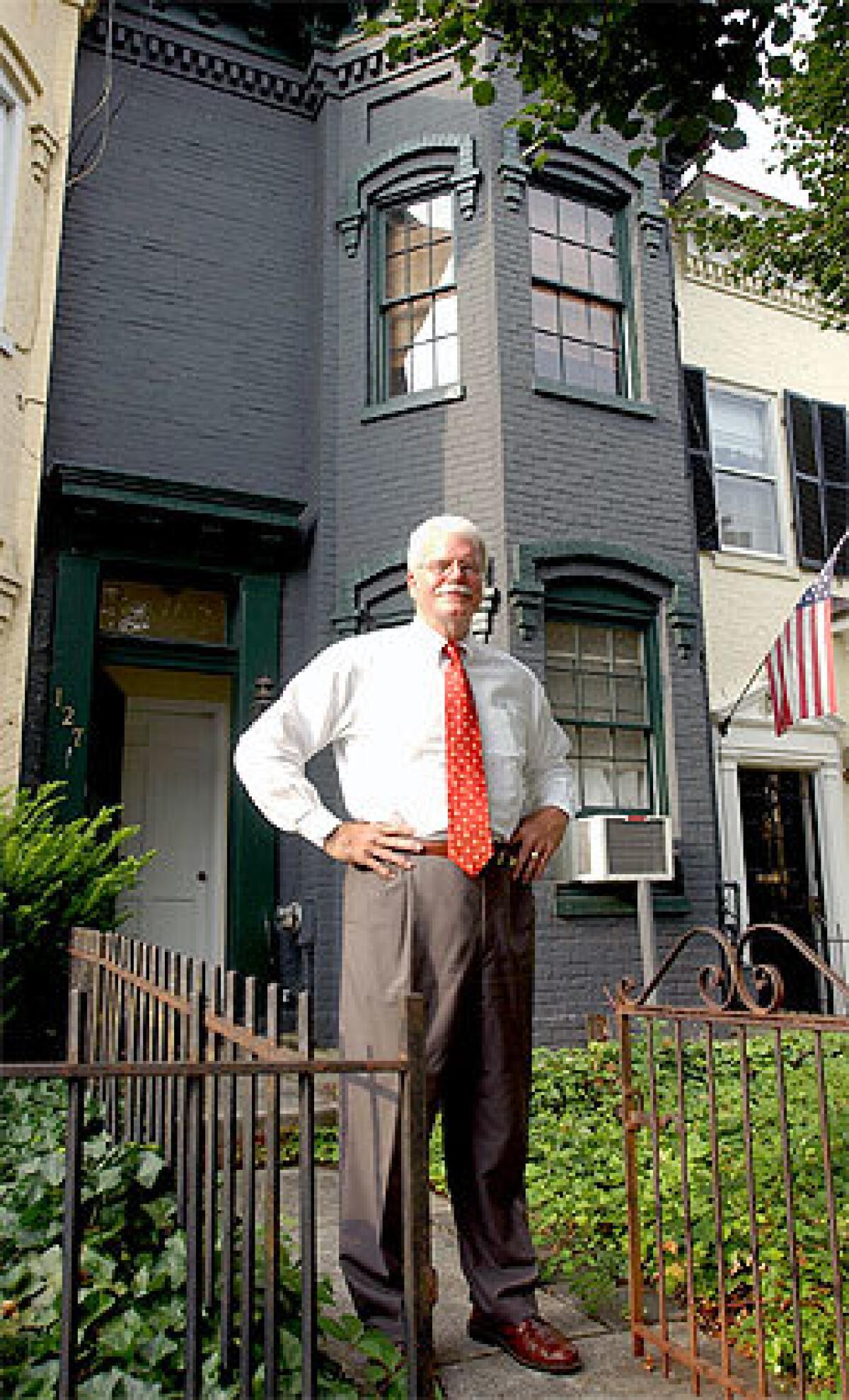 LIVE-IN LANDLORD: Rep. George Miller in front of his Washington town house (the animal house) that he has shared with various fellow Democrats for more than 20 years. The house has few rules, but no Republicans are allowed.