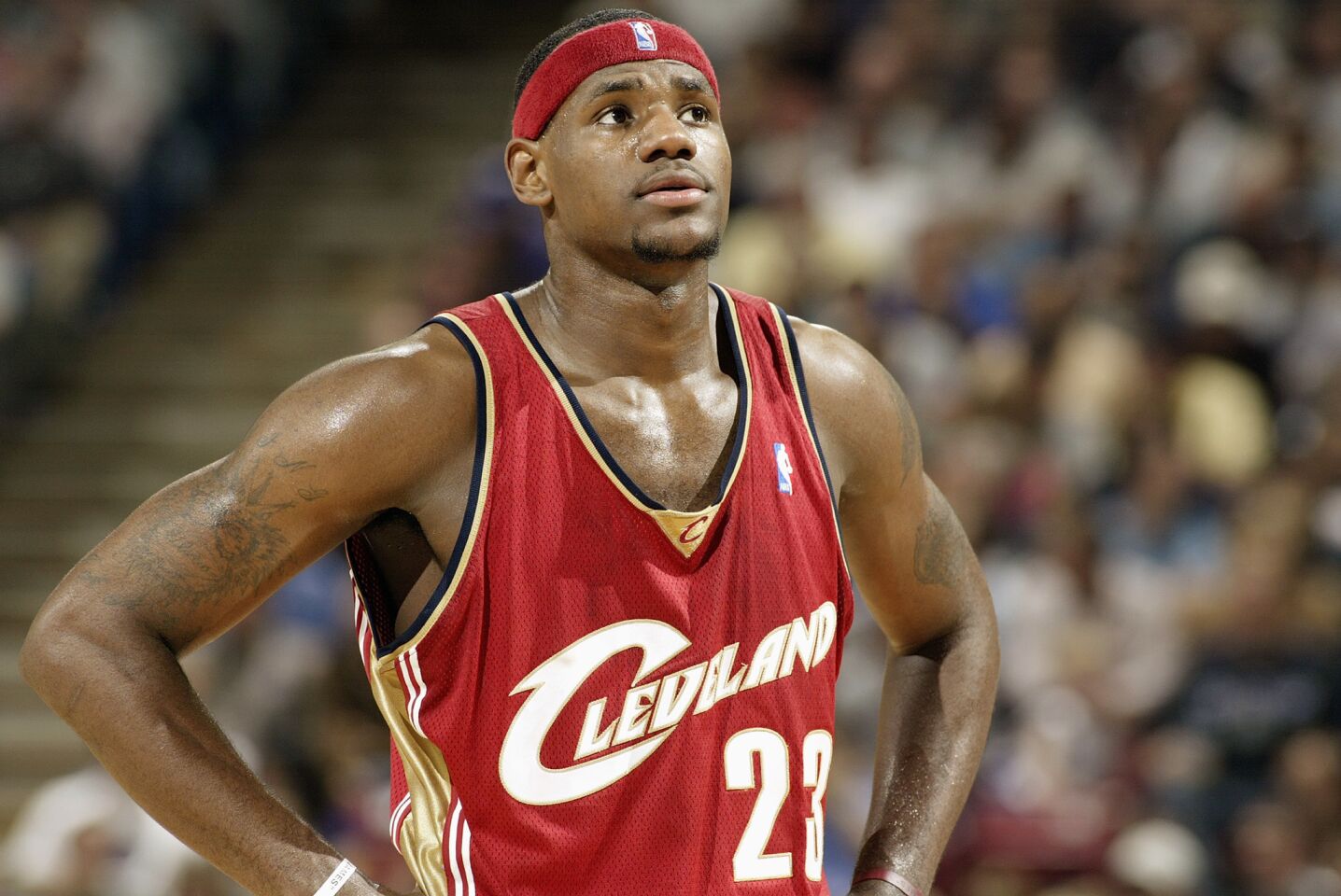 First game: LeBron James of the Cleveland Cavaliers looks on during the game against the Sacramento Kings at Arco Arena on Oct. 29, 2003, in Sacramento.