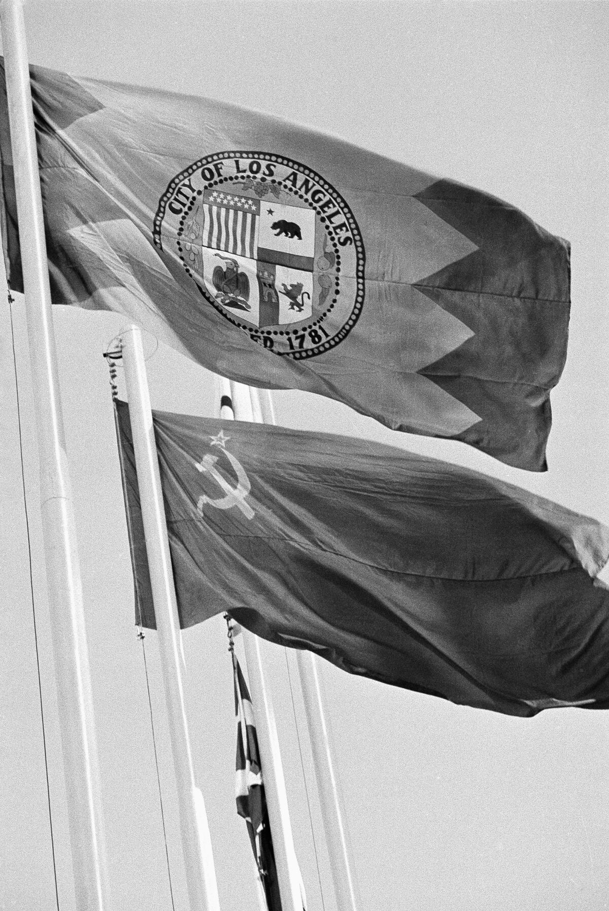 The Los Angeles city flag flies next to the Soviet Union's during the closing ceremony of the 1980 Moscow Olympics.