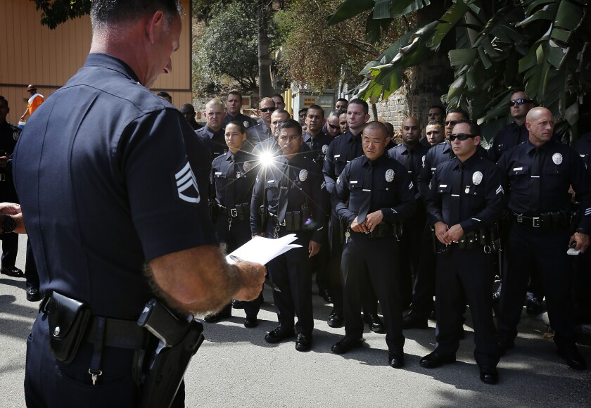 A sergeant speaks to a platoon of LAPD Metropolitan Division officers deployed in 2015 