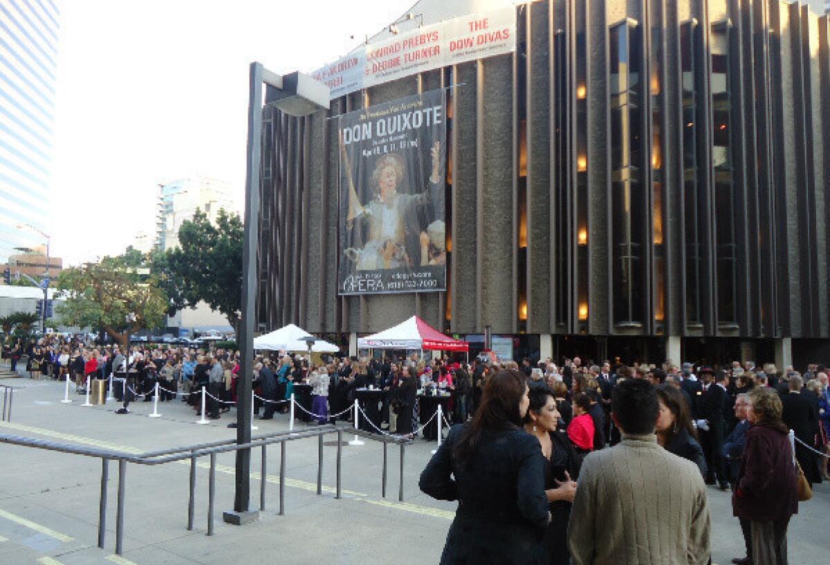 San Diego Opera patrons gather outside the Civic Theatre in downtown San Diego before a recent performance of "Don Quixote."