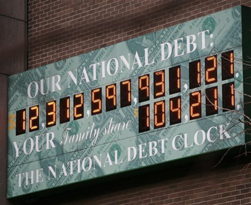 This 2010 photo of the National Debt Clock in New York City shows it to be $12.3 trillion. It now tops $22 trillion.