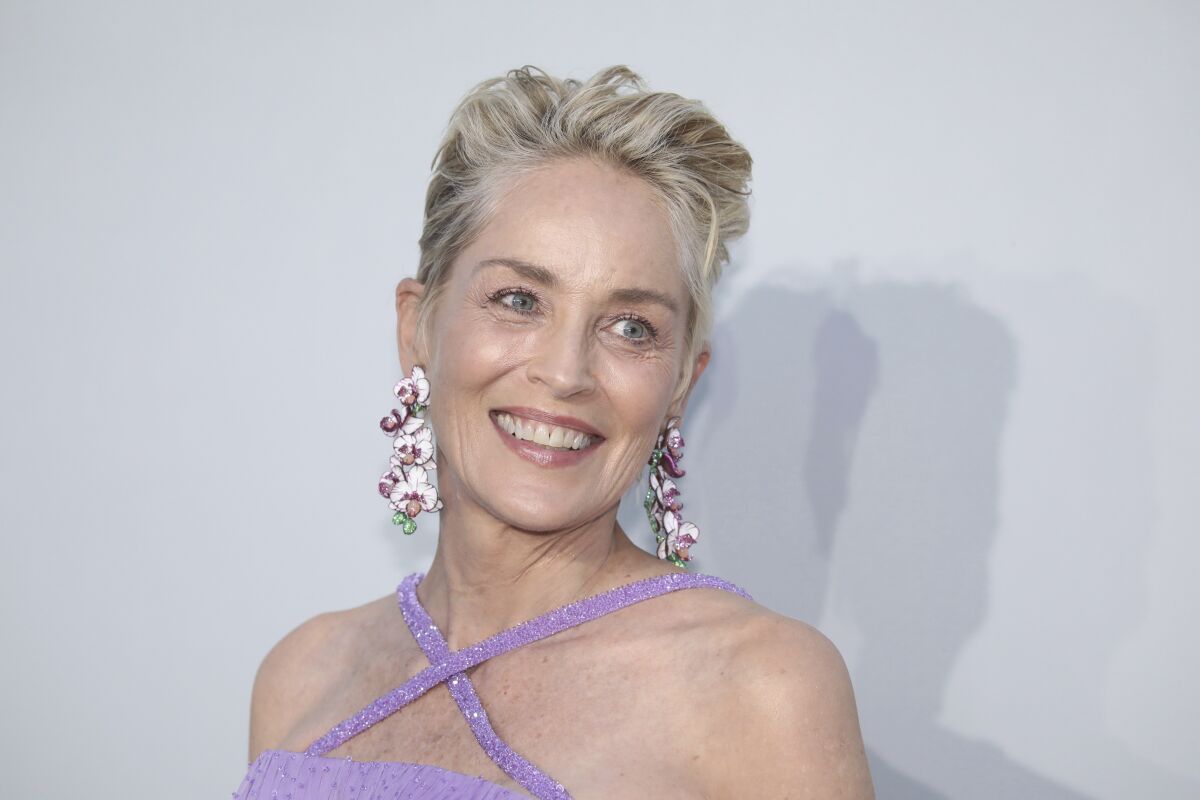Sharon Stone poses for photographers upon arrival at the amfAR Cinema Against AIDS benefit the during the 74th Cannes international film festival, Cap d'Antibes, southern France, Friday, July 16, 2021. (Photo by Vianney Le Caer/Invision/AP)