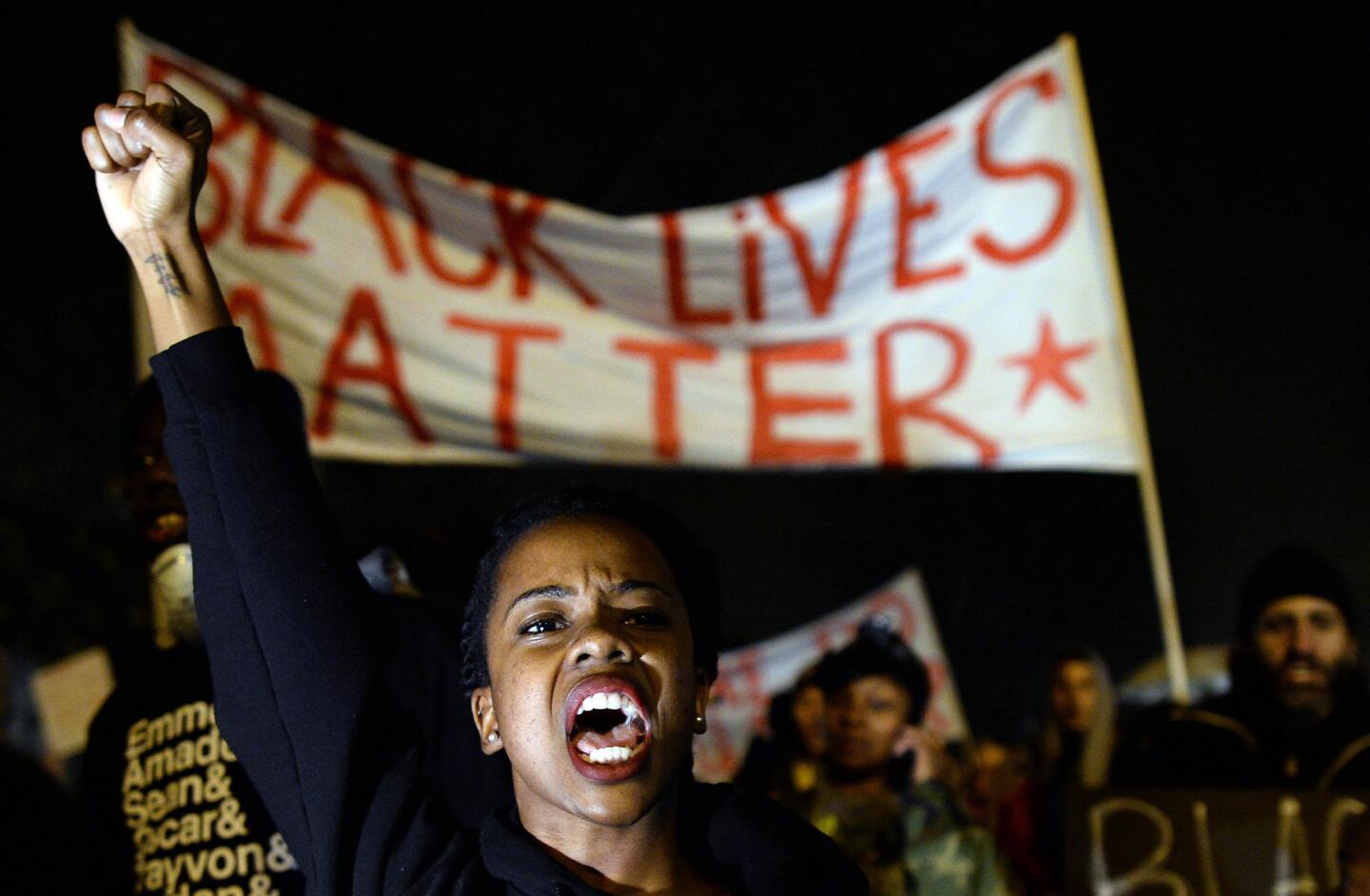 Demonstrators shout slogans during a march in St. Louis, Missouri, on Nov. 23 to protest the death of 18-year-old Michael Brown.