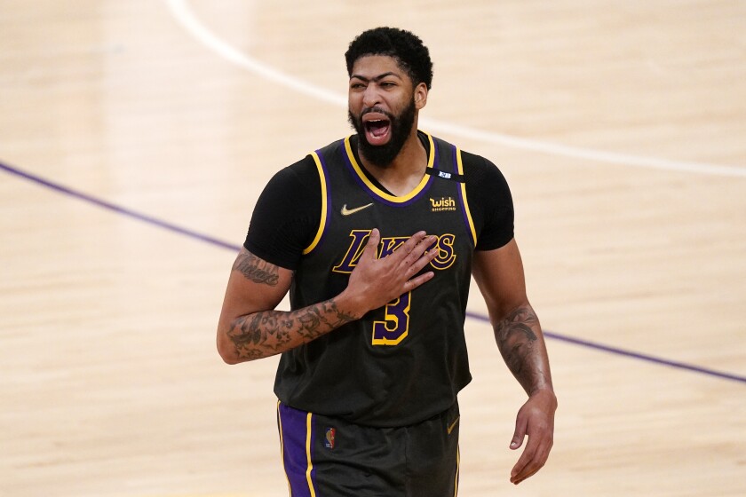 Los Angeles Lakers forward Anthony Davis celebrates after the Lakers defeated the Denver Nuggets 93-89 in a NBA basketball game Monday, May 3, 2021, in Los Angeles. (AP Photo/Mark J. Terrill)