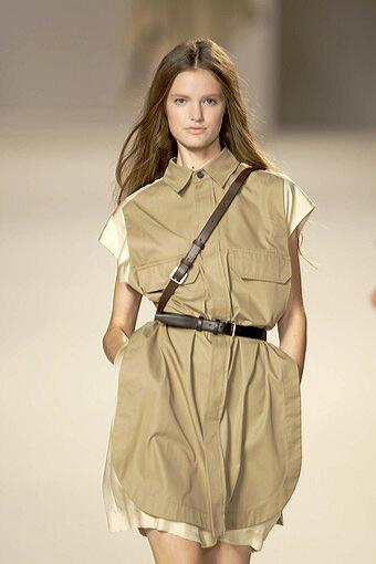 Alexander Wang incorporated the look heavily into his spring 2010 collection, showing khaki vests, blazers and leather trousers on the runway in a relaxed and slouchy silhouette. At Chloé (pictured), the influence was lighter and the lines cleaner, seen in buttoned-up military-style shirts tucked neatly into khaki pants and tan sleeveless shirts nipped in with thin brown belts. MORE LINKS: Spring fashion trends: A peek into the boudoir Spring fashion trends: That '70s style Get the full story