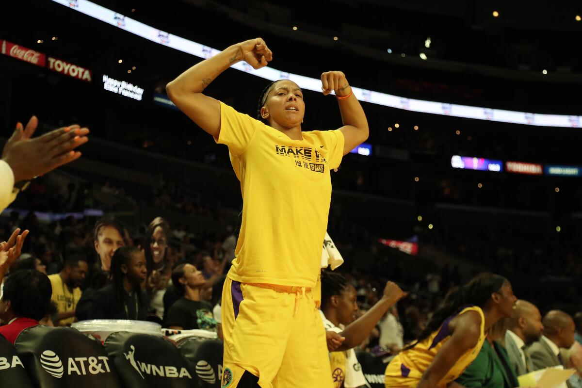 Sparks forward Candace Parker reacts from the bench during Sunday's playoff win over the Seattle Storm.