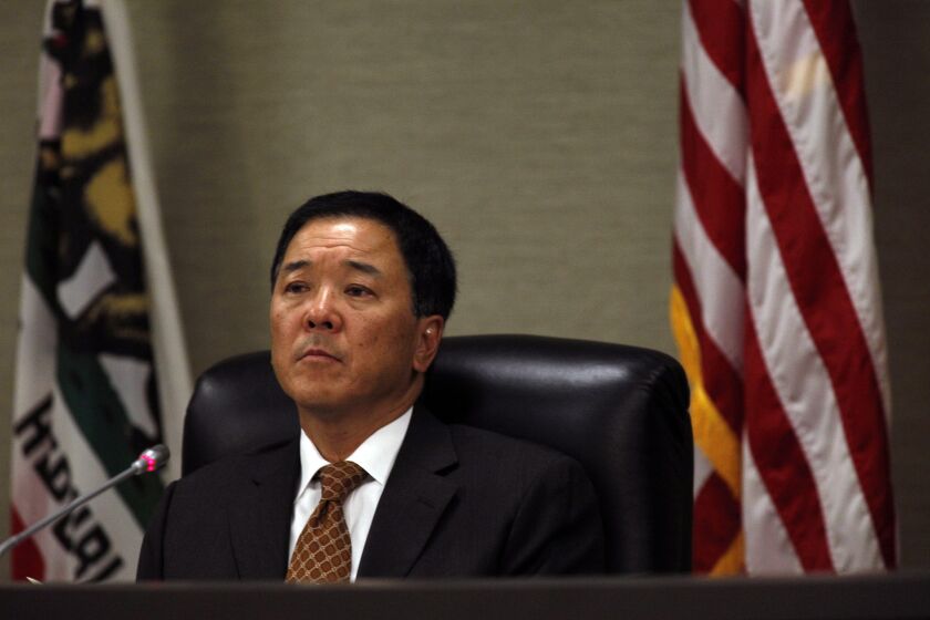 Paul Tanaka, shown in 2014, surrendered to authorities Thursday after being indicted by a federal grand jury investigating excessive force and corruption in L.A. County jails.