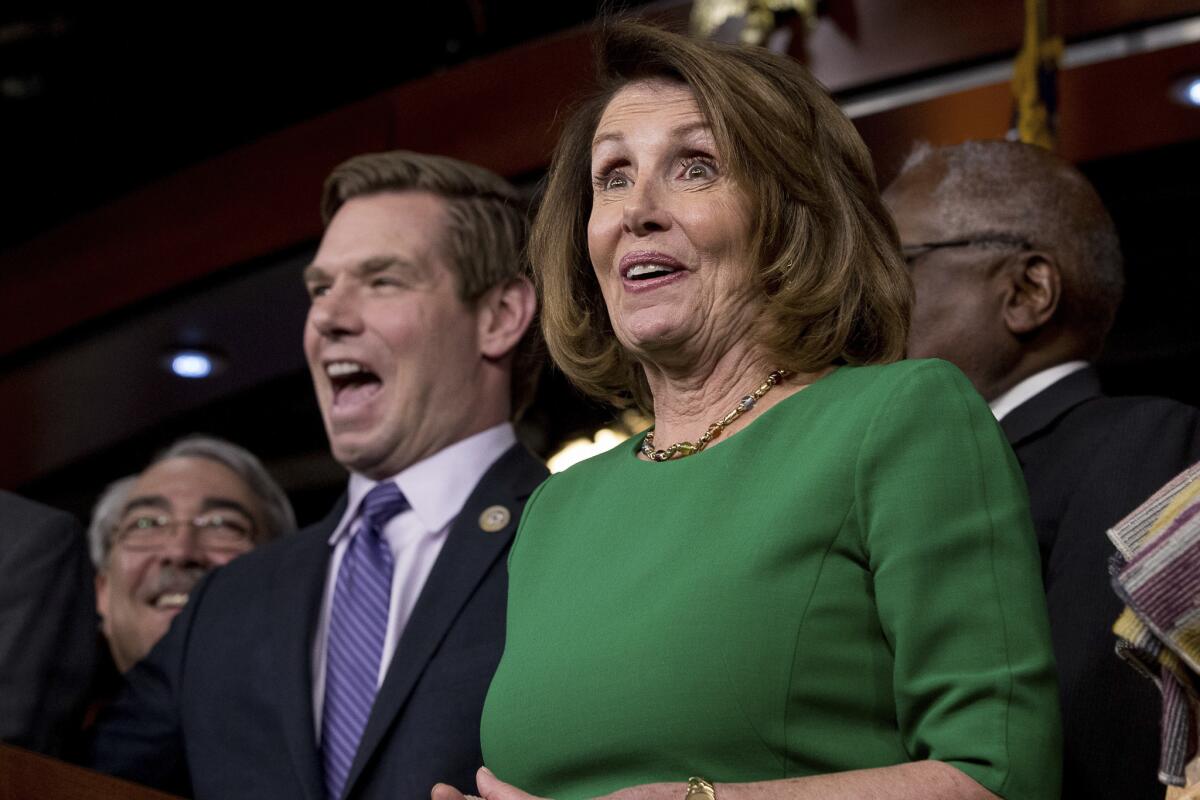 House Minority Leader Nancy Pelosi of Calif., right, accompanied by Rep. G. K. Butterfield, D-N.C., left, and Rep. Eric Swalwell, D-Calif., second from left, as they joke while speaking at a news conference on Capitol Hill in Washington, Friday, March 24, 2017. Republican leaders have abruptly pulled their troubled health care overhaul bill off the House floor, short of votes and eager to avoid a humiliating defeat for President Donald Trump and GOP leaders.