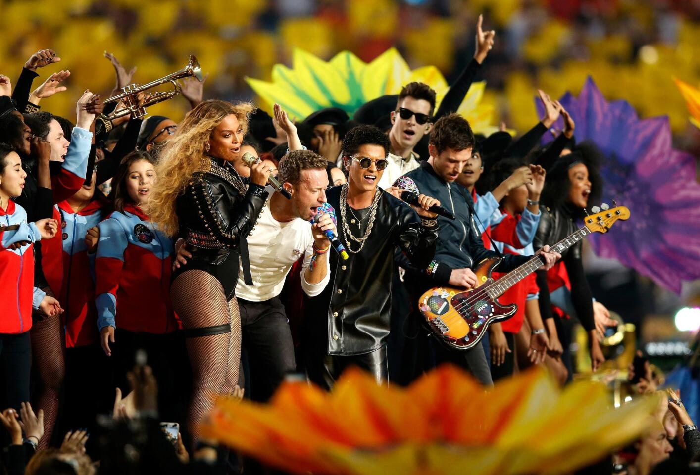 Beyonce, Chris Martin of Coldplay, Bruno Mars, Mark Ronson and Guy Berryman of Coldplay perform during the Pepsi Super Bowl 50 Halftime Show at Levi's Stadium. Ezra Shaw/Getty Image