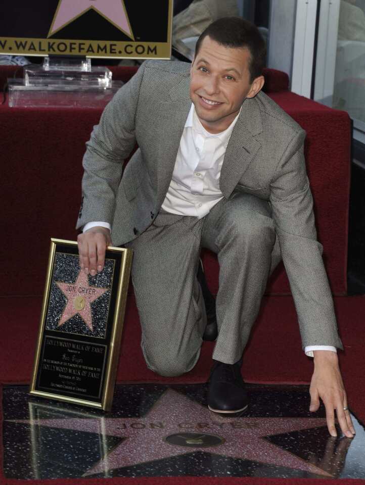 Jon Cryer got his star the same day "Two and a Half Men" came back to TV with a new cast lineup.